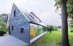 Energetska efikasna kuća sa staklenim zidom u Holandiji
