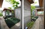 Šarmantna japanska kuća sa garažom sa zelenim krovom